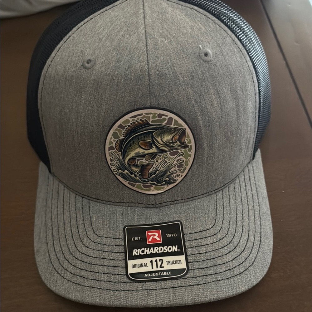 Centennial supply company Richardson Gray and Black Trucker Hat